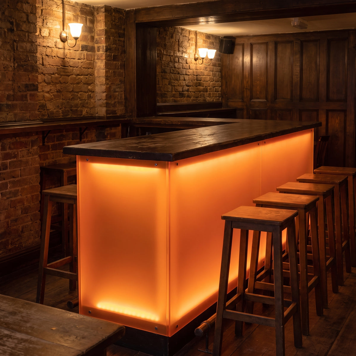 Mandarin Orange frosted Perspex acrylic sheet (S2 3T17) used as a back-lit bar front