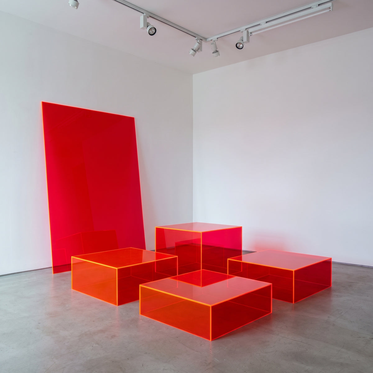 Fluorescent Mars Red 4T56 Perspex plinths with glowing edges