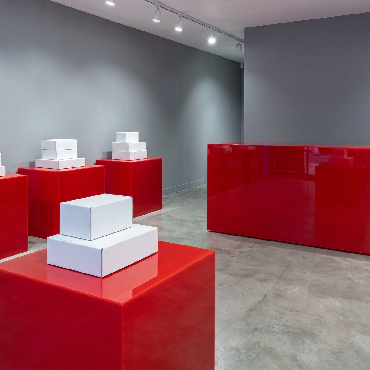 Red 440 Perspex display cubes and counter